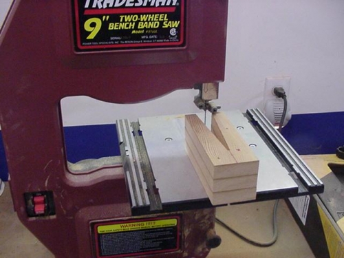 Cutting the clamping blocks on the bandsaw.