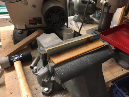 straight strip in the vise - pre-bend