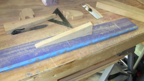 Balsa sections being shaed to fit inside of rib.