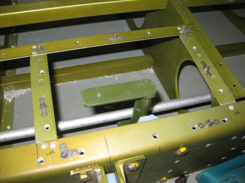 Positioning plate nuts for the access panel screws